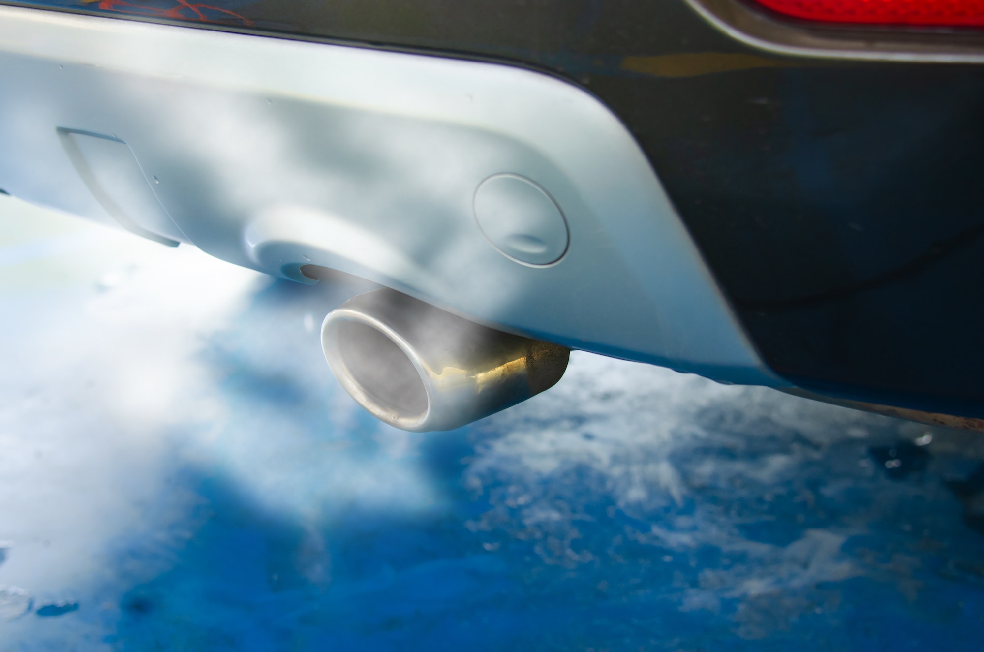 Car exhaust while leaving a smoke.